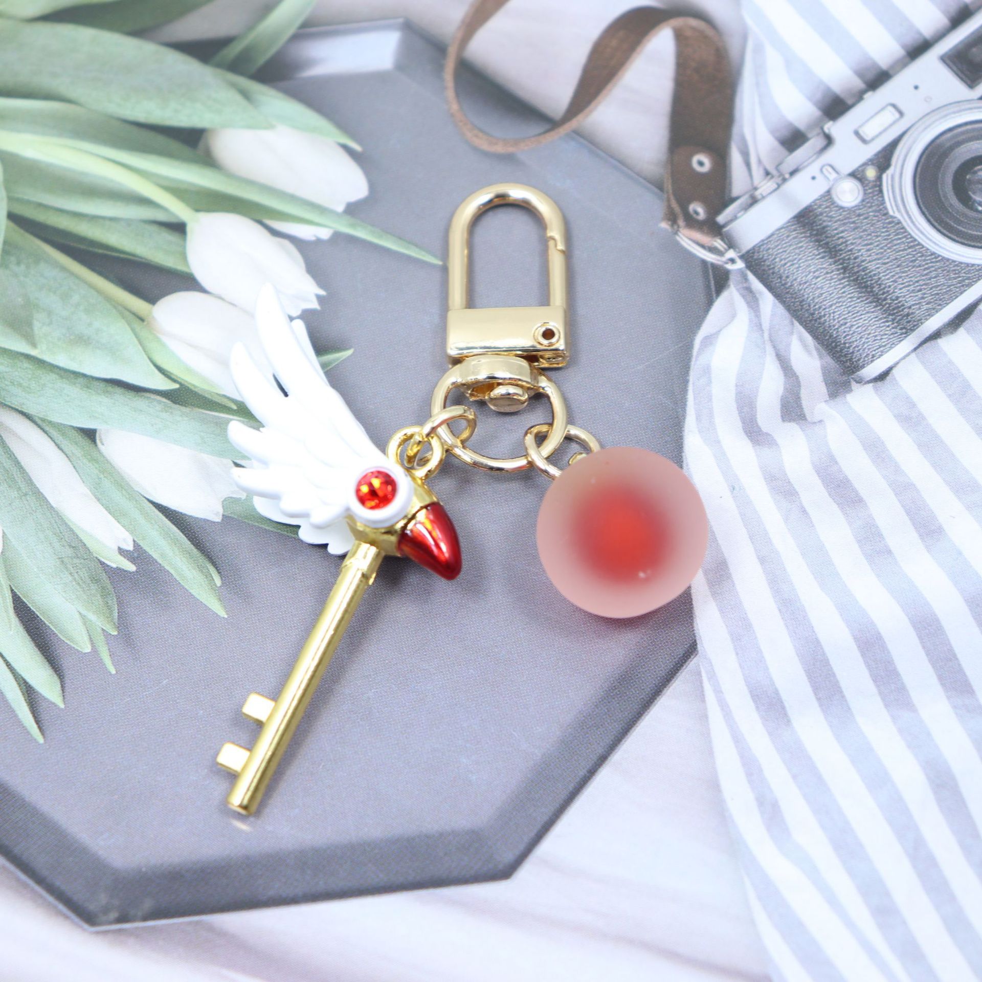 Móc Khóa Mỏ Chim Sakura Có Bi Ngọc