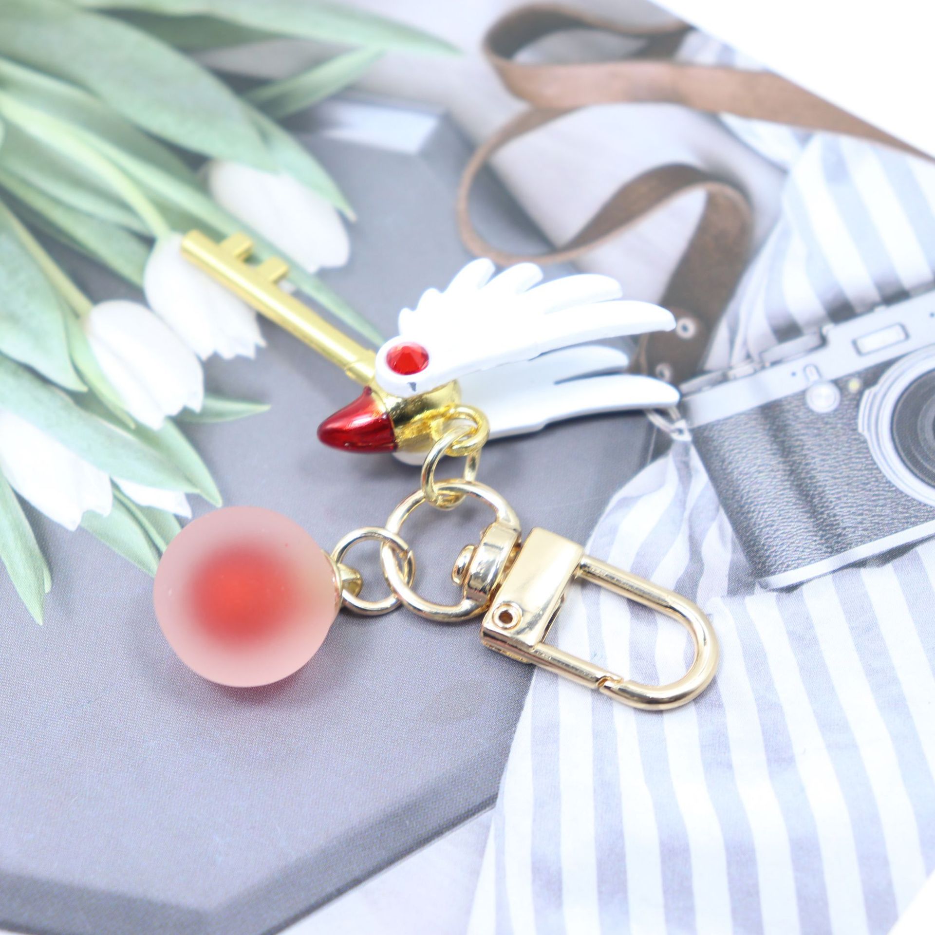 Móc Khóa Mỏ Chim Sakura Có Bi Ngọc