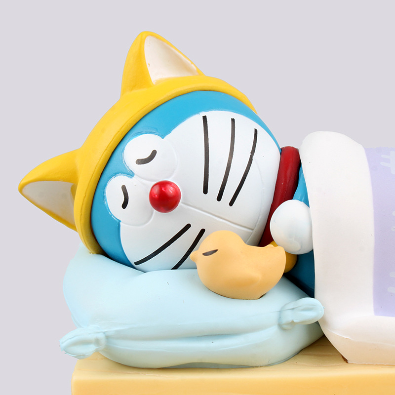 Bạn Muốn Mô Hình Doraemon Nằm Ngủ kiêm Giá Đỡ Điện Thoại Đẹp tại HCM